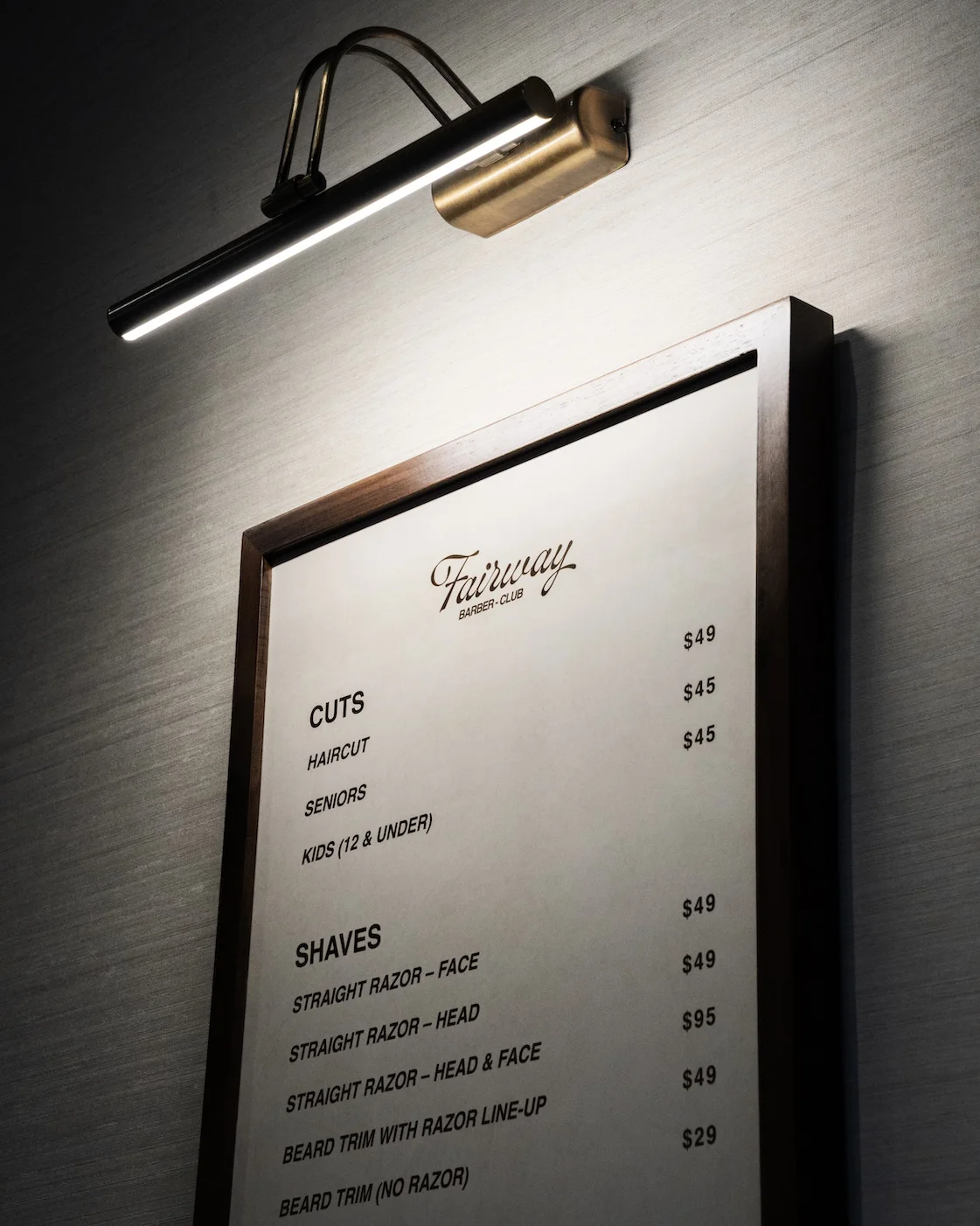 Fairway Barber Club service menu with cuts and shaves pricing
